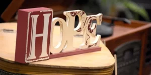 A "Hope" sign on a banquet table.